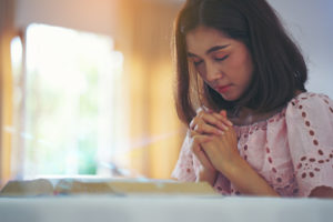 Woman,Hands,Praying,To,God,With,The,Bible.,Woman,Pray